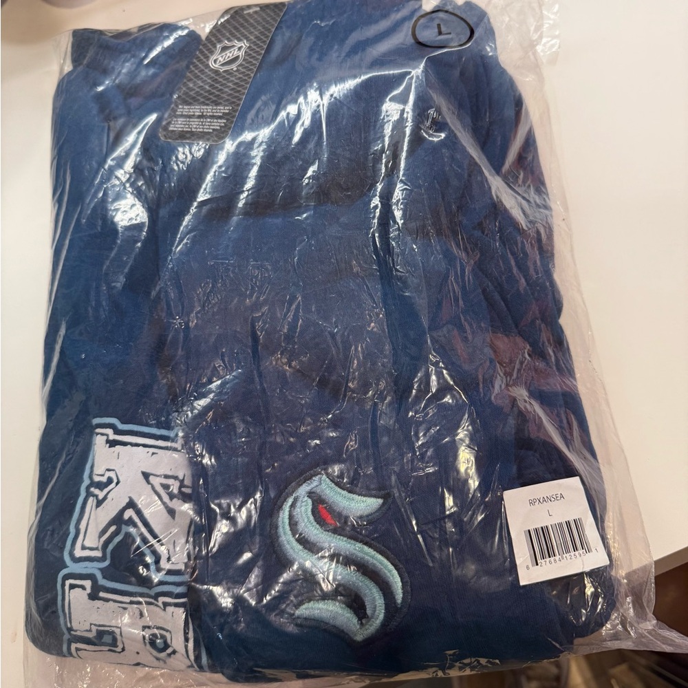 Brand new men’s Kracken sweats.